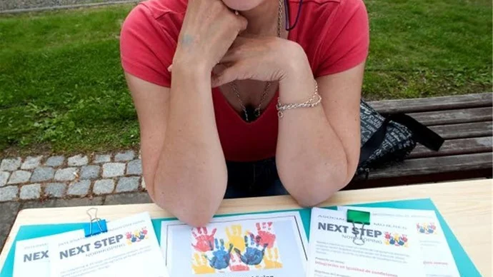Maria Delprato är engagerad i den internationella kvinnoföreningen Next Step.