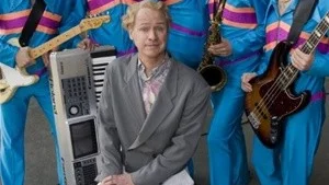 Rolandz dansband med komikern Robert Gustafsson i spetsen.