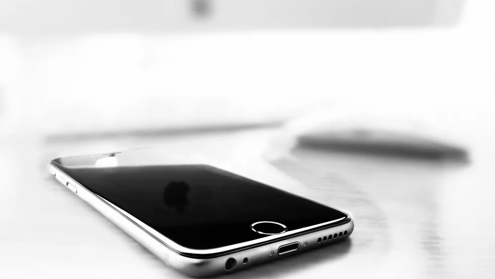 En man i 60-årsåldern åtalas för olaga förföljelse mot en kvinna. Hans telefon användes som hjälpmedel, enligt åklagaren.