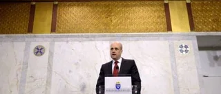 Reinfeldt bär också guldbyxor