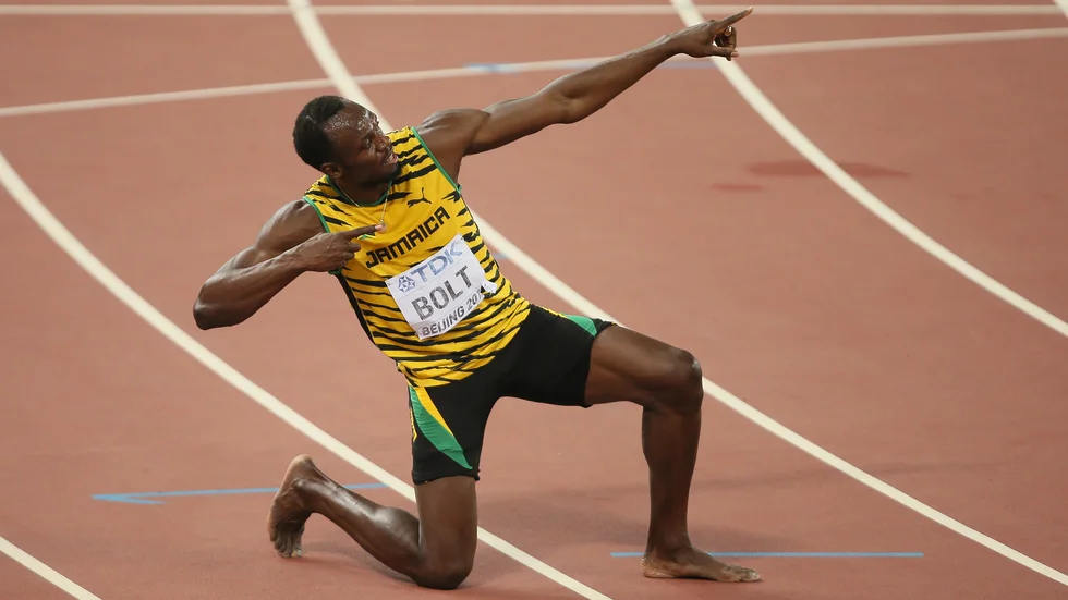 Usain Bolt firar en vinst under AAF World Championships 2015.