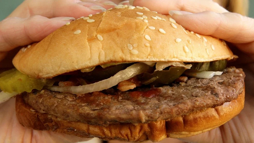 FILE - This Monday, Oct. 26, 2009 file photo shows a Whopper sandwich at a Burger King restaurant in Allison Park, Pa. Soaring beef prices have hurt fast-food restaurants that feature the meat as the centerpiece of their menus: Burger King, Wendys and McDonalds _ the nations three biggest burger chains _ all say theyre dealing with higher beef costs. (AP Photo/Gene J. Puskar, File)