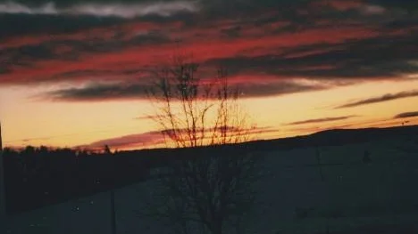 Aftonrodnad över Bonäset, Öjebyn, fångad på bild av Sven Lindgren.