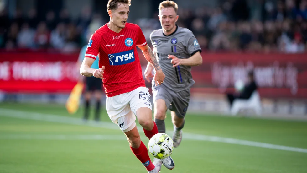 Linköpingskillen Pontus Rödin, Silkeborg, får fira cupguld i Danmark efter segern mot Århus. Arkivbild.