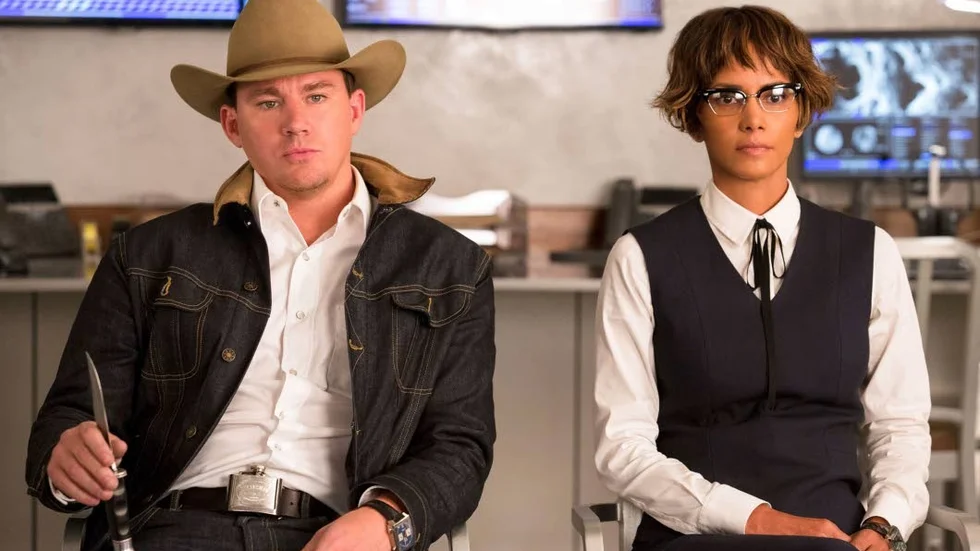 This image released by Twentieth Century Fox shows Channing Tatum, left, and Halle Berry in "Kingsman: The Golden Circle." (Giles Keyte/Twentieth Century Fox via AP)