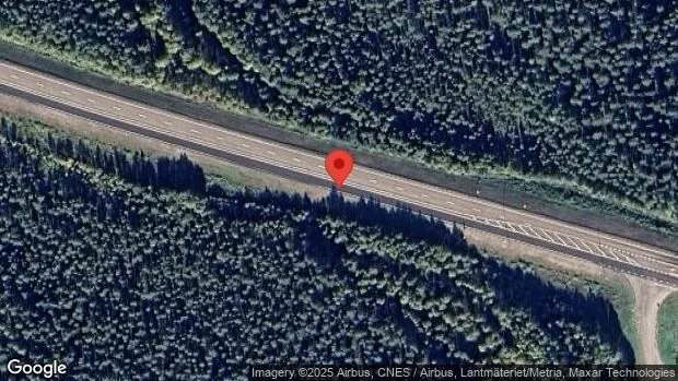 Stopp i ett körfält på grund av en stillastående personbil på E4