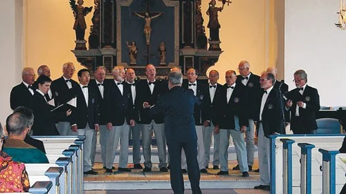 Kalmar Manskör sjöng i Virserums kyrka under Lions Clubs 50-årsfirande.