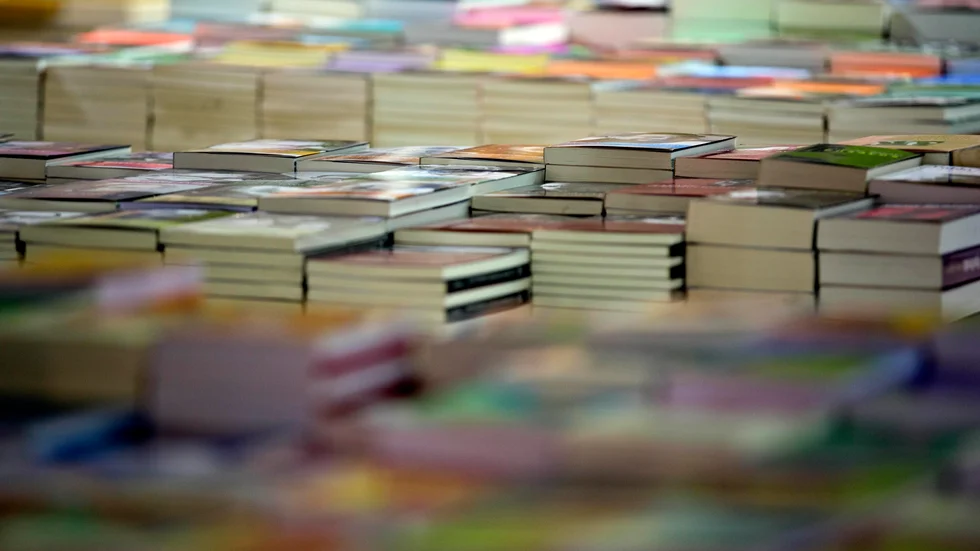 Books lay on a stand at Buenos Aires' annual book fair in Buenos Aires, Argentina, Tuesday, April 22, 2014. The book fair officially opens on Thursday. (AP Photo/Natacha Pisarenko)
