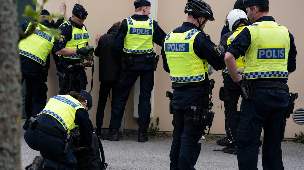 Demonstranter visiteras av polis i Malmö 2019. Arkivbild.