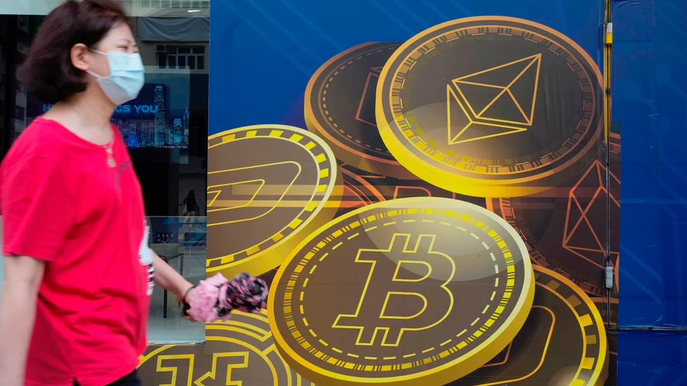 Reklam för bitcoin i Hongkong. Arkivbild.