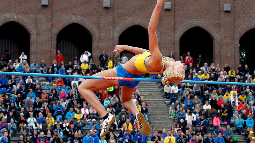 Bild från när Maja Nilsson hoppar i Finnkampen på Stockholm stadion. Om två år, 2025, firar Finnkampen 100 år.