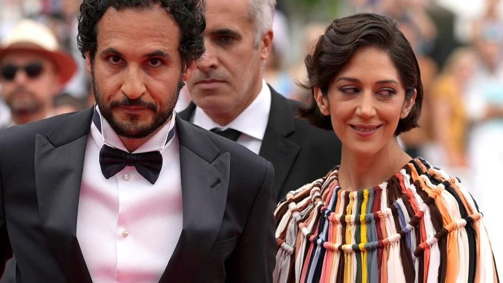 Regissören Ali Abbasi och Zar Amir-Ebrahimi inför premiärvisningen av "Holy spider" på filmfestivalen i Cannes.