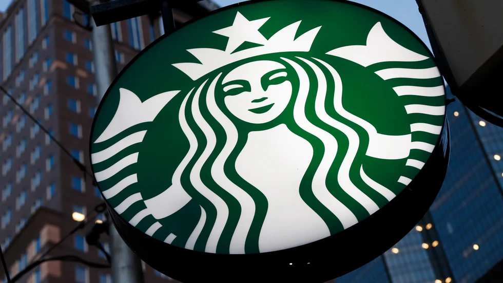 En Starbucks-skylt i Pittsburgh. Arkivbild.