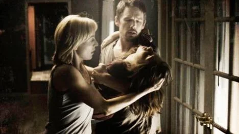 Juliet Rylance, Ethan Hawke och Michael Hall i rysaren Sinister.