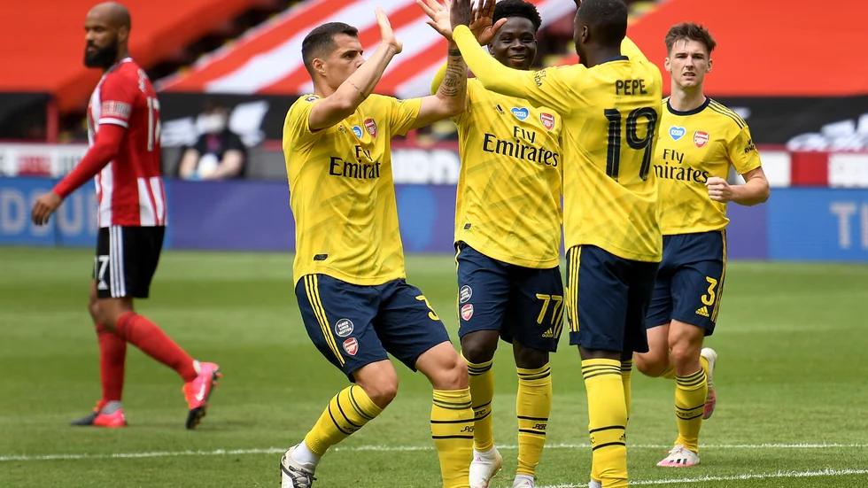Nicolas Pépé firar sitt straffmål i FA-cupkvartsfinalen borta mot Sheffield United.