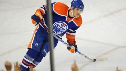 Edmonton Oilers' Linus Omark(23) celebrates his winning shootout goal against the Tampa Bay Lightning during NHL hockey action in Edmonton on Friday, Dec. 10, 2010. (AP Photo/The Canadian Press - Ian Jackson)