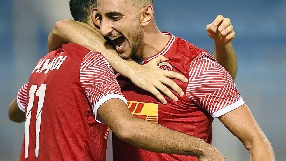 Nyköpingsanfallaren Mahmoud Eid har arbetsbeskrivningen att producera på fotbollsplaner i Bahrain. Här firar han ett av sina två mål i senaste cupmatchen.