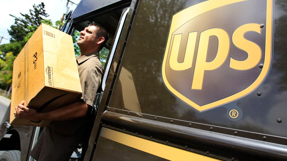 UPS pressas av dyrare kollektivavtal och minskad efterfrågan. Arkivbild