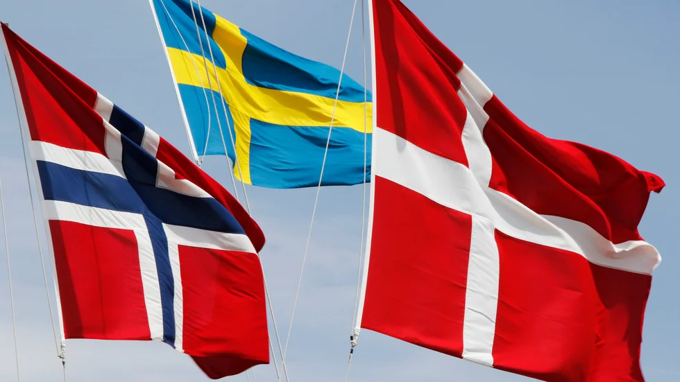 Danmarks flagga Dannebrogen kan snart få konkurrens på danska flaggstänger. Arkivbild.