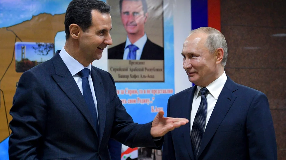 Väldigt mycket blod på två diktatorers händer. En mindre och en större krigsherre, Assad och Putin, vid en träff i Damaskus för fyra år sedan. 