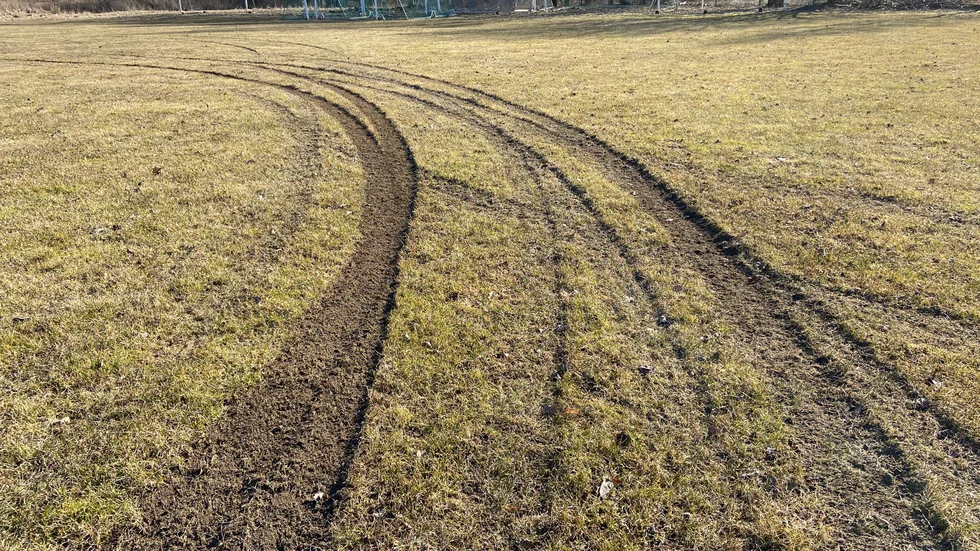 Djupa hjulspår och en delvis förstörd fotbollssäsong är resultatet efter att någon eller några sladdat med bil på Värmbols IP.