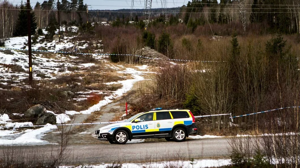 En mördad man hittades  i en brinnande rishög i februari.