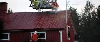 Mördad kvinna i brinnande hus