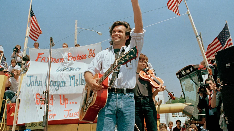 John Mellencamp uppträder för proteserande bönder i Chillicothe i Misouri 1986. 