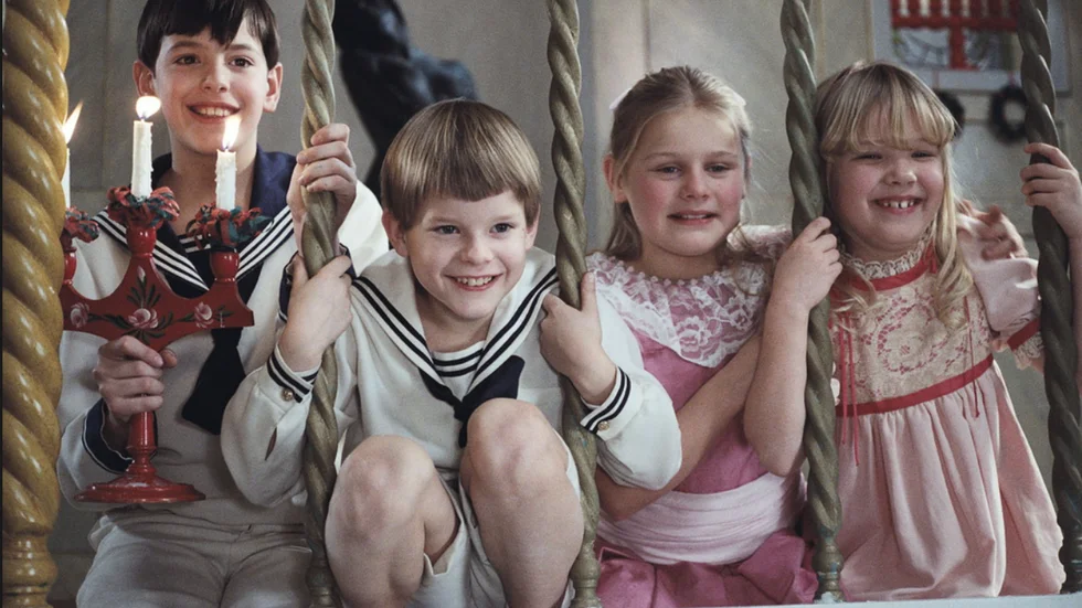 "Den förföriska bilden av julen är en falsk illusion", anser NSD-krönikören Lina Norberg Juuso. På bilden syns barnen under julfirandet i Ingmar Bergmans klassiska film "Fanny och Alexander".