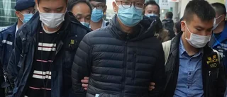 Två misstänkta efter tidningsrazzia i Hongkong