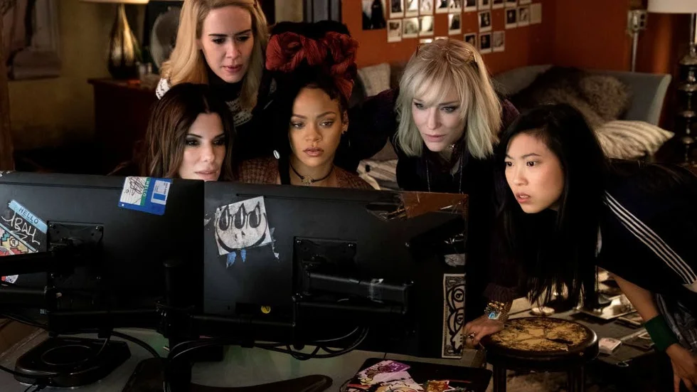 This image released by Warner Bros. shows, from foreground left, Sandra Bullock Sarah Paulson, Rihanna, Cate Blanchett and Awkwafina in a scene from "Ocean's 8." (Barry Wetcher/Warner Bros. via AP)