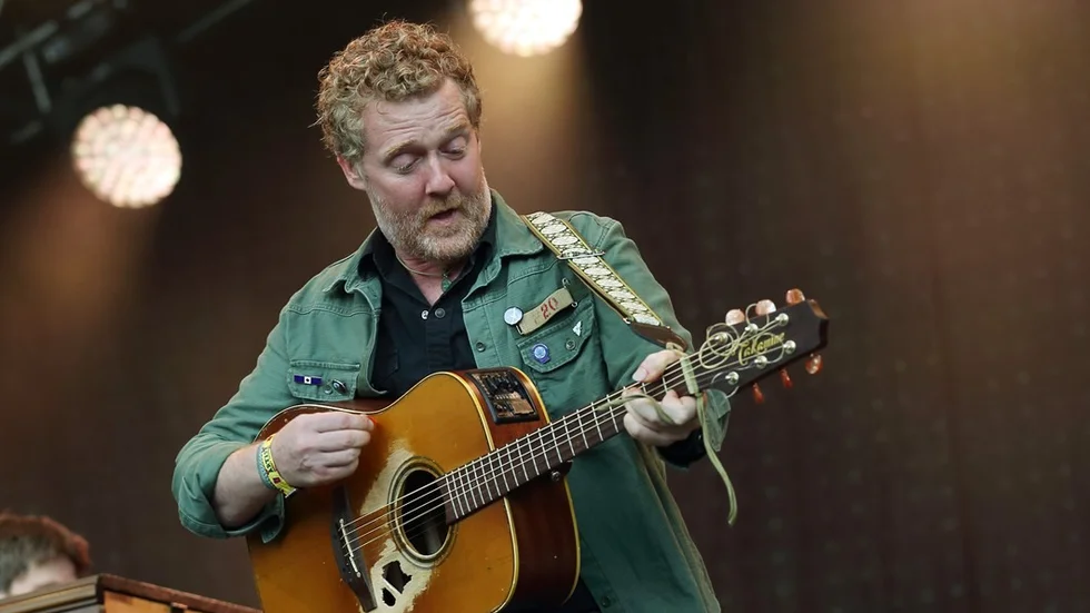 Glen Hansard performs at Lollapalooza in Chicago's Grant Park on Sunday, Aug. 3, 2014. (Photo by Steve C.  Mitchell/Invision/AP)