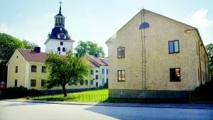 Värda att bevara? Politikerna vill se hur ett alternativ där de två 40-talshusen på fastigheten Prosten 10 får stå kvar. Foto: Mattias Ahlm
