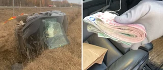 Bil voltade på E18 – polisen fann knark och kontanter i vraket