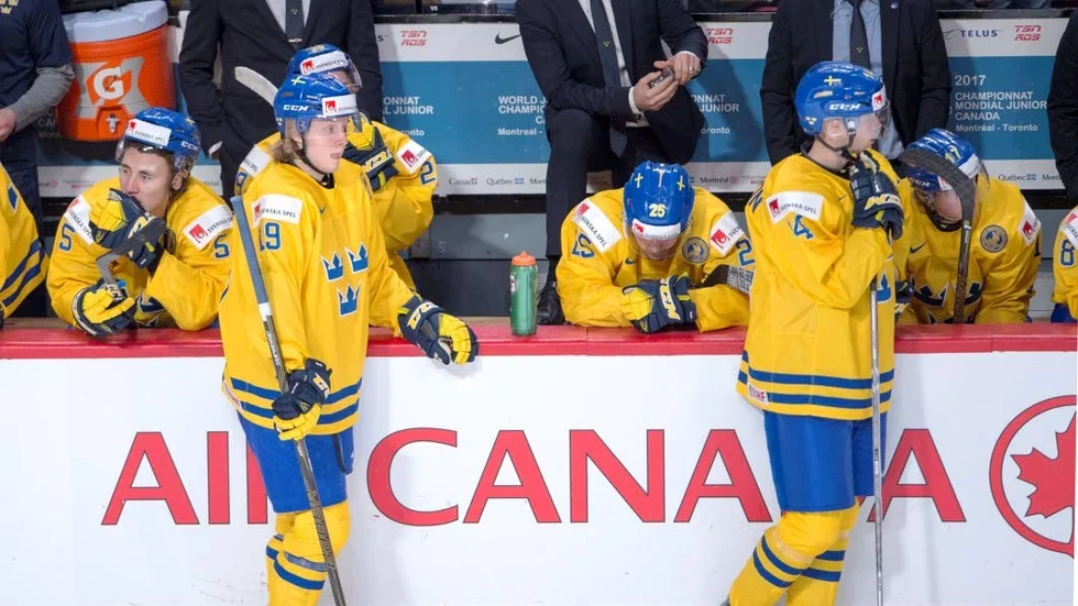 Team Sweden players watch Team Canada celebrate after losing in a semifinal game at the World Junior ice hockey championships, Wednesday, Jan. 4, 2017 in Montreal. (Ryan Remiorz/The Canadian Press via AP)