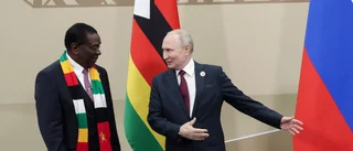 Putin förärar Zimbabwekollega helikopter