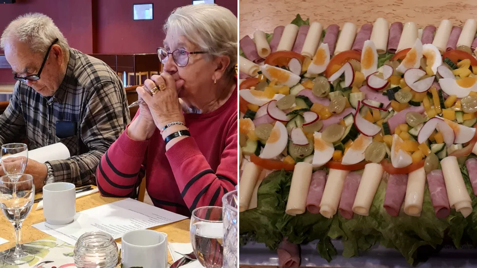 Två av mötets engagerade deltagare som fördjutar sig i dagordningen. Efter mötet serverades en god smörgåstårta.