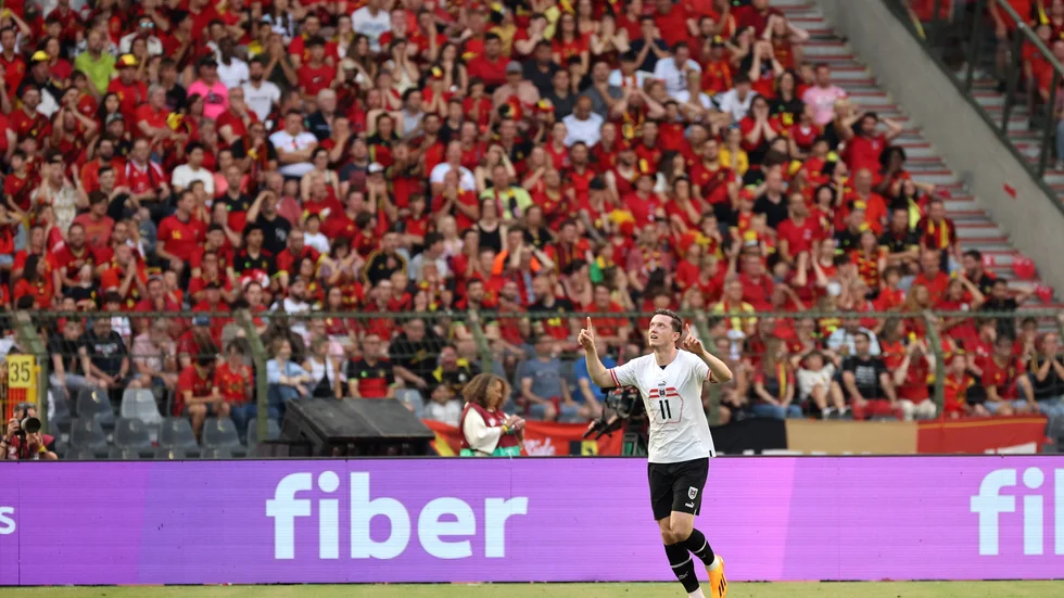 Österrikes Michael Gregoritsch jublar efter 1–0-målet borta mot Belgien.