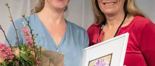 Karin belönas för trädgårdarna på Näs