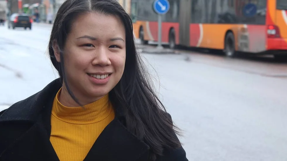 Julie Tran (C).