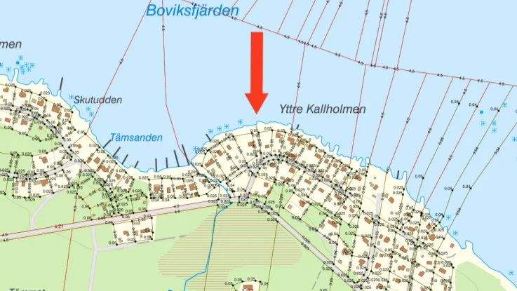 Pilen visar platsen där den lilla båthamnen får byggas.
