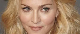 Madonna skriver nytt till samlings-cd