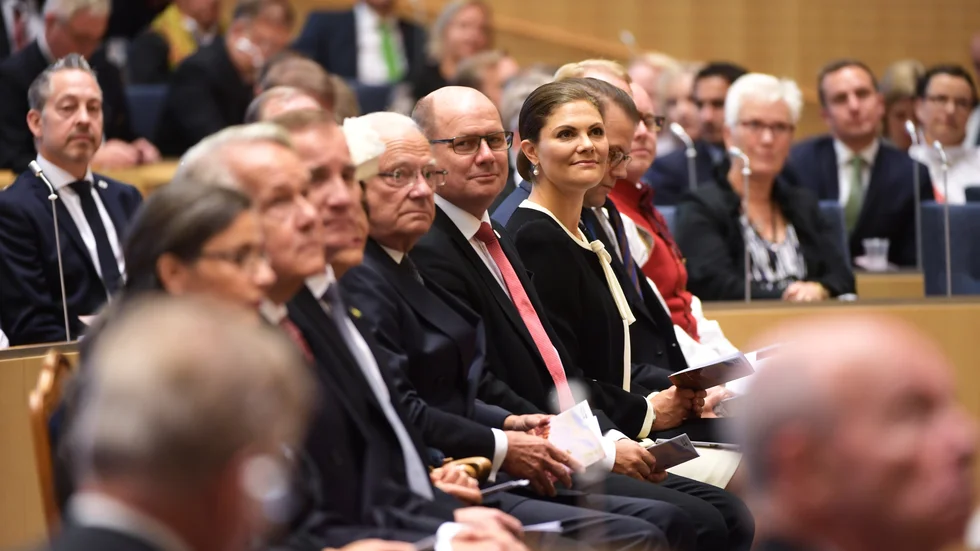 Statsminister Stefan Löfven, kung Carl Gustaf, Urban Ahlin, förste talman, och kronprinsessan Victoria i riksdagshuset under riksmötets öppnande 2017.