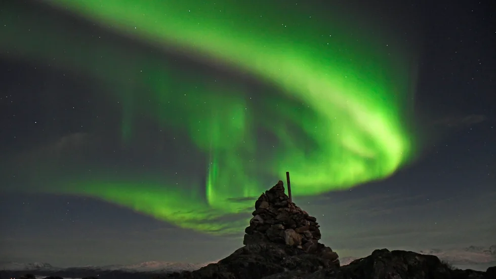 Norrsken fotograferat i Tromsö i Norge. Arkivbild.