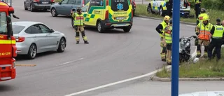 En bil och mc i kollision
