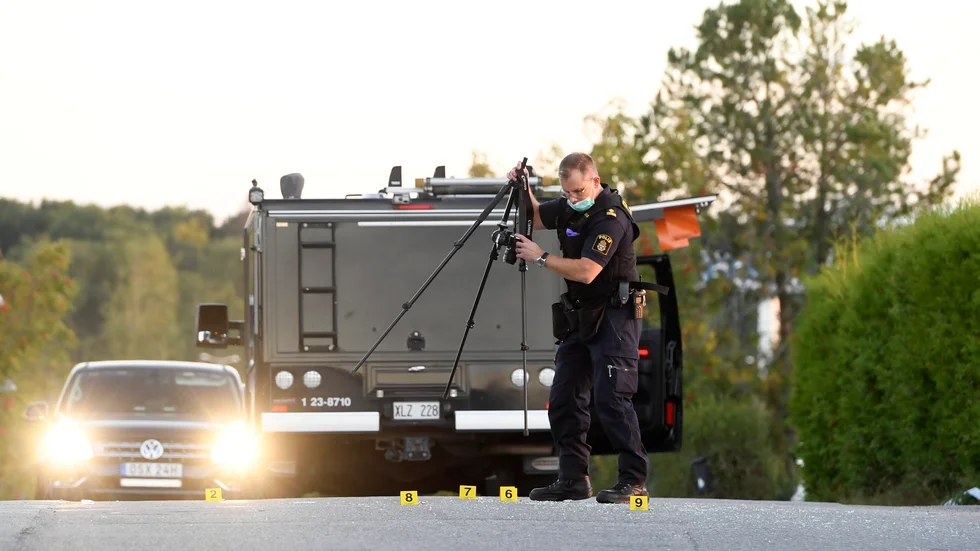 Polisens tekniker på den misstänkta brottsplatsen.