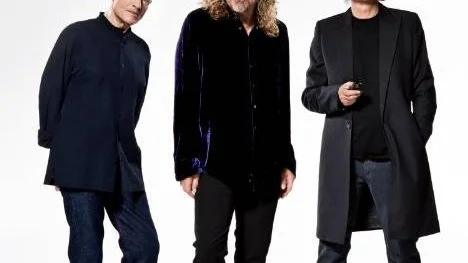 This undated handout photo provided by the Warner Music Group shows members of Led Zepplin, from left, John Paul Jones, Robert Plant and Jimmy Page. Led Zeppelin is coming to a movie theater near you. Then a record store. The iconic British rock 'n' roll band will release its 2007 Celebration Day" reunion as a concert film on Oct. 13, then will put out the show on multiple video and audio formats on Nov. 19. (AP Photo/Warner Music Group, Soren Solkaer Starbird)