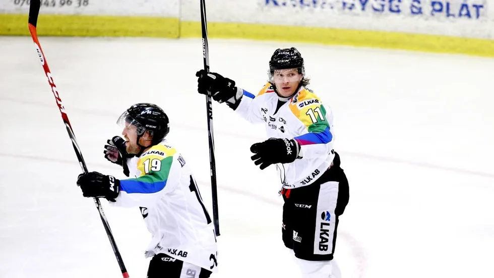 Mikael Lasu, till vänster.