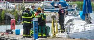 En person till sjukhus efter båtbrand – rådigt ingripande från hamngäster förhindrade spridning 
