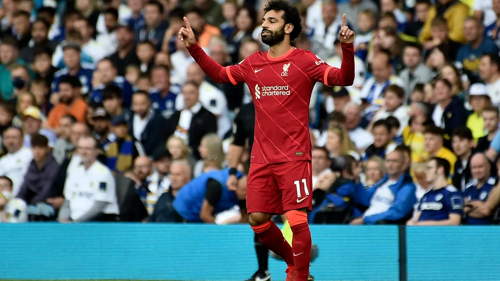 Liverpools Mohamed Salah firar sitt 100:e Premier League-mål i 3–0-segern över Leeds.